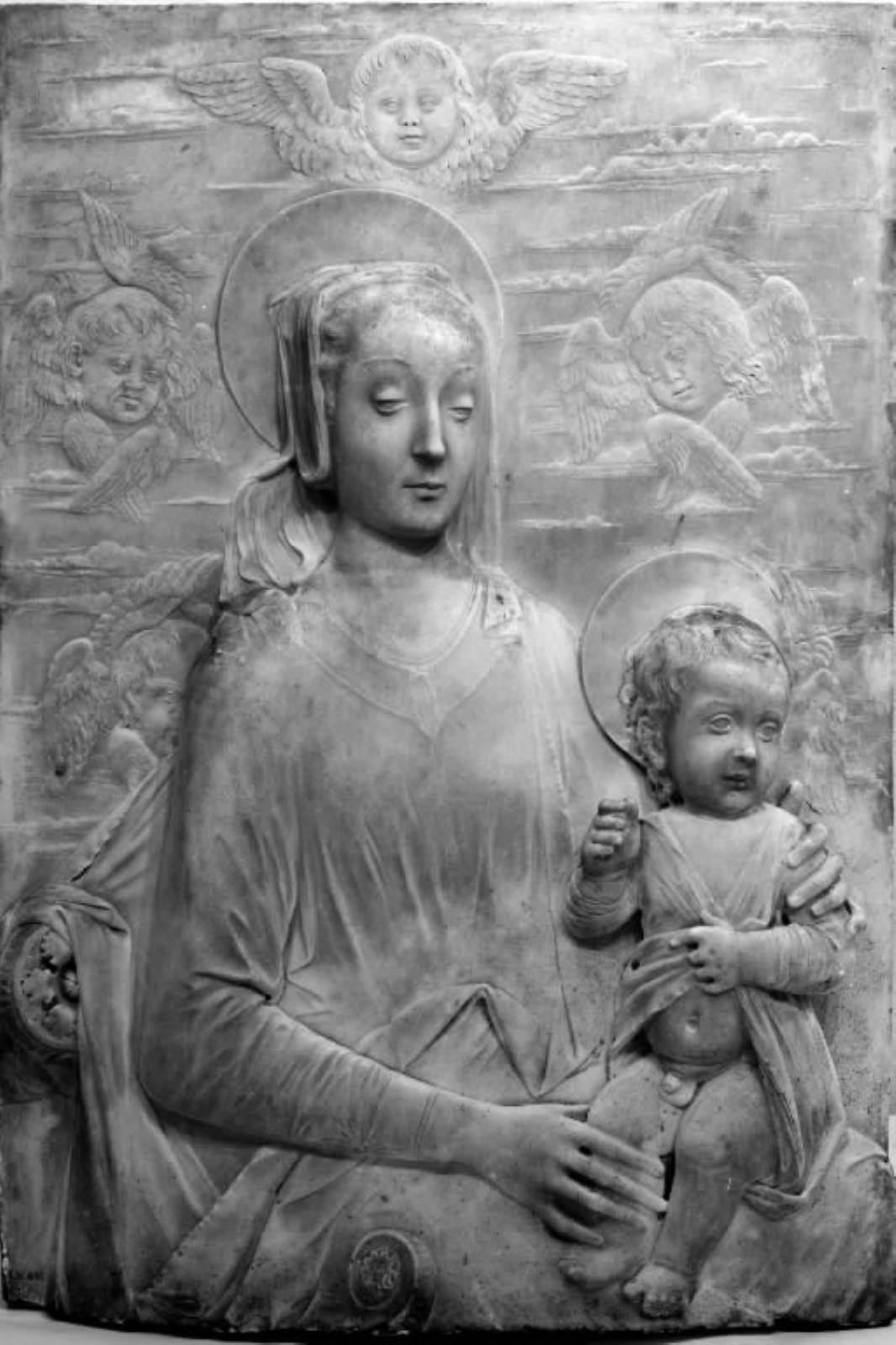 Virgin and Child with three Cherub Heads