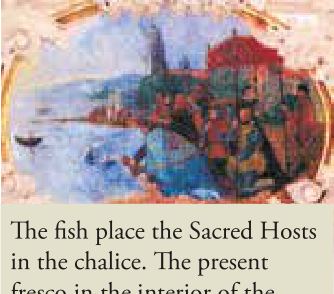 The fish place the Sacred Hosts in the chalice. The present frieze in the interior of the Church of the Parish of Almacera