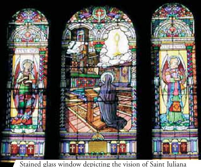 Stained glass window depicting the vision of Saint Juliana