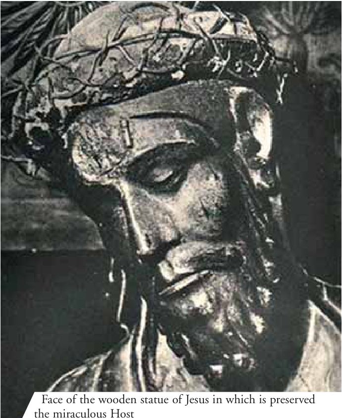 Face of the wooden statue of Jesus in which is preserved the miraculous Host